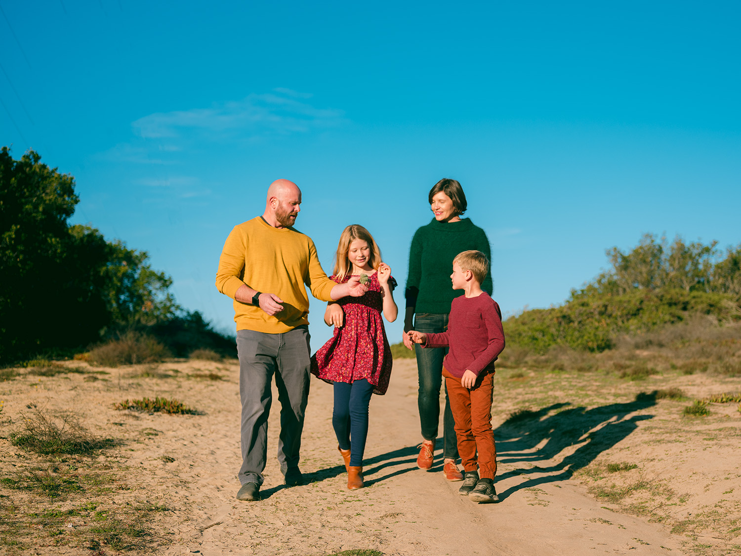 Family walking on a scenic trail in Mill Valley during a relaxed outdoor portrait session
